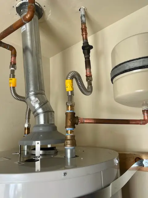 Water heater installation and plumbing repair in Evans